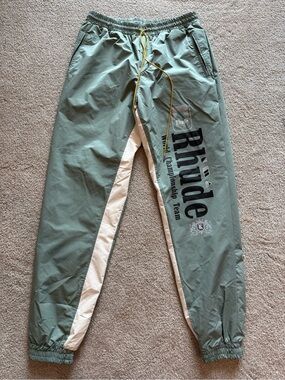 Rhude Sage Green and White Logo Track Pants with Yellow Drawcords